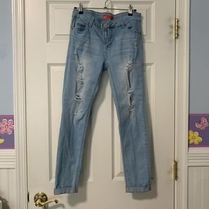 Butt lifting mid rise distressed jeans